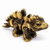 mini stegosaurus zlatočerný